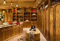 a large closet filled with lots of wooden furniture