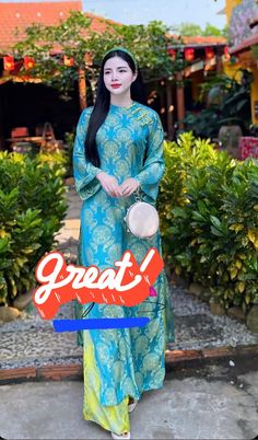 This is a Gam set. Loose form ( ao dai Dang Suong). You can able to remove those buttons around your neck easy if you dont want it.  SET: 1 BLUE TOP + 1 GREEN PANT ( COLOR & TEXTURE LOOKS EXACTLY THE SAME IN THE MODEL PICS) MATERIAL: GAM VAI THO DOI (top & bottom) . 3/10 stretch Pls take a look at the size chart before placing order bc we DO NOT ACCEPT RETURN or EXCHANGED. Please contact us within 3 days of receiving your order if the merchandise damages. Elegant Long Sleeve Ao Dai For Traditional Ceremonies, Elegant Long Ao Dai For Traditional Ceremonies, Long Sleeve Fitted Ao Dai For Traditional Ceremonies, Elegant Long Sleeve Ao Dai For Eid, Festive Long Sleeve Ao Dai For Traditional Ceremonies, Traditional Long Sleeve Ao Dai For Festive Occasions, Long Sleeve Ao Dai For Eid Wedding, Long Sleeve Ao Dai For Wedding Eid Festival, Green Long Sleeve Ao Dai For Wedding