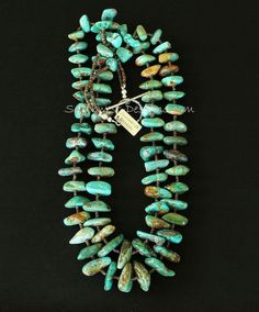 This outstanding Necklace showcases 2 strands of Royston Turquoise Large Nuggets. Royston Turquoise comes from the Royston Mining District near Tonopah, Nevada, and is known for its wide spectrum of colors ranging from soft blue to emerald green. Our Royston displays numerous hues — including light blue, turquoise blue, blue-green, fern green and olive — splashed with golden brown matrix. The stones are graduated, ranging from 13mm to 26mm in length. The varied colors and shapes combine to produ Turquoise Multi-strand Hand-strung Jewelry, Southwestern Multi-strand Turquoise Jewelry, Unique Turquoise Multi-strand Jewelry, Unique Multi-strand Turquoise Necklace, Unique Multi-strand Turquoise Jewelry, Artisan Turquoise Double Strand Beaded Necklace, Multi-strand Turquoise Necklace With Natural Stones, Handmade Turquoise Double Strand Jewelry, Handmade Double Strand Turquoise Jewelry