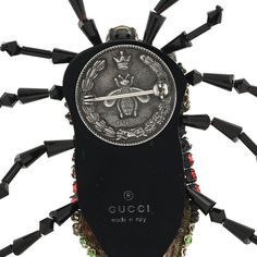 This is an authentic GUCCI Metal Crystal Beetle Brooch Multicolor. This stylish chic brooch is crafted of black resin with an overlay of yellow and black crystals in the shape of a bee. Beetle Brooch, Black Resin, Yellow And Black, Black Crystals, The Shape, Bee, Gucci, Crystals, Yellow