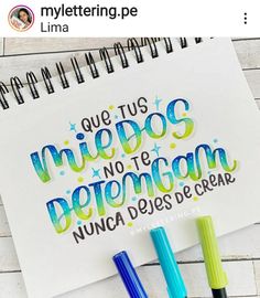 some pens are laying on top of a paper with the words, que tus medos no te beremgan nunca des de se e crear