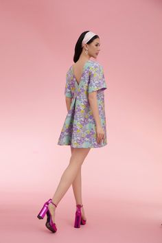 This elegant above-the-knee dress features a boat neck and trapezoid silhouette, perfect for any occasion. Made from high-quality brocade fabric, it offers a timeless and sophisticated look that will turn heads. Above The Knee Dress, Mean Blvd, Brocade Fabric, Knee Dress, Box Pleats, Above The Knee, Boat Neck, V Shape, Online Fashion