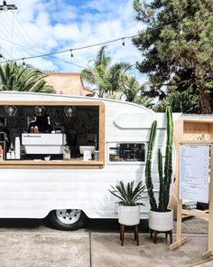 an old camper converted into a coffee shop