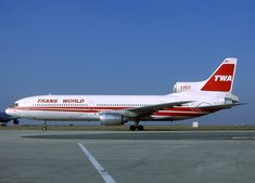 a large passenger jet sitting on top of an airport tarmac