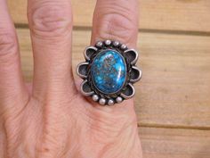 Sterling Silver Morenci Turquoise Ring Size 8.75. We can size it for an additional fee, please email me with what size you need and I'll get back to you with a price. The face of the ring measures 24 milllimeters in length and 24 millimeters across. The stone measures 16 millimeters in length and 11 millimeters across. This turquoise has a very interesting matrix which is complimented by the silver detailing around the stone. A beautiful everyday piece! Thank you for stopping by my shop, please Adjustable Blue Turquoise Ring Collectible, Adjustable Vintage Nickel-free Turquoise Ring, Sterling Silver Multi-stone Turquoise Ring, Morenci Turquoise, Gift Multi-stone Turquoise Ring In Sterling Silver, Nickel-free Sterling Silver Turquoise Ring, Unique Nickel-free Sterling Silver Turquoise Ring, Silver Turquoise, Turquoise Sterling Silver