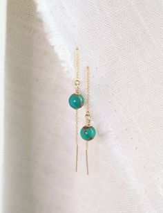 Details:  - Handmade Item - Genuine and natural Turquoise - 3in 14k Gold filled or Sterling Silver* chain - Lead and Nickel Free. Safe for sensitive skin. * sterling silver can show signs of tarnish, use microfiber cloth to clean ** the bar is delicate, gently insert through earring hole Each earring set arrives on a jewelry card. We strive to make a positive impact on our earth which is why our earrings are packaged and sent to you using recyclable paper envelopes and jewelry cards. Please recycle accordingly!  Please note:  Because we use natural and genuine crystals and stones, there may be slight variations in size and color unique to each order.  All information about the metaphysical properties of the crystals is for reference only. Using or wearing crystals or stones does not mean t Wearing Crystals, Jewelry Pictures, Jewelry Cards, Earring Hole, Turquoise Drop Earrings, Our Earth, Earring Ideas, Earrings Turquoise, Jewelry Picture