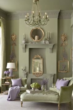 a living room filled with furniture and a chandelier