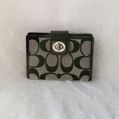 Nwot Coach Signature Wallet/Card Case. Features Patent Leather Trim, Silver Turn Lock Closure, Exterior Id Window, 2 Card Slots, 2 Interior Pockets And Id Window. Approximate Measurements 4 1/4"(W) X 3"(H). Beautiful! Coach Rectangular Wallet With Snap Closure, Formal Coach Card Holder, Classic Green Rectangular Coin Purse, Coach Green Wallet For Everyday Use, Green Coach Wallet For Everyday Use, Envelope Wallet, Brown Wallet, Signature Canvas, Wallet Card