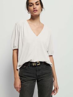 Not your boyfriend's v-neck. Shirred cuffs and front and back yoke give it that relaxed vibe, with a subtle balloon sleeve for a feminine twist. (This one comes in Porcelain). | Edie Top in Porcelain | Ethical Essentials Classic V-neck Blouse With Relaxed Fit, Classic V-neck Relaxed Fit Blouse, Relaxed V-neck Top For Spring, Chic Relaxed Fit V-neck Top, V-neck Blouse For Everyday Fall Wear, Fall V-neck Everyday Blouse, Everyday Fall V-neck Blouse, Modern Relaxed Fit V-neck Top, Modern V-neck Blouse With Relaxed Fit