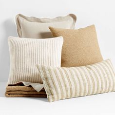 three pillows stacked on top of each other