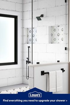 a bathroom with white brick walls and black trim