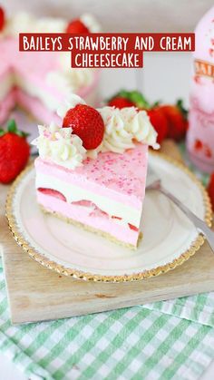 a slice of strawberry and cream cheesecake on a plate with strawberries next to it