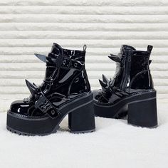 New 4 3/4" (121mm) Block Heel, 2 1/4" (57mm) Cleated Platform Ankle Boots Claw Spike Studded Front Shield W/ Coffin Buckle Straps Inside Metal Zip Closure Black Shiny Patent Designed And Made By Demonia Punk Ankle-high Winter Heels, Punk Style Ankle-high Winter Heels, Punk High Ankle Heels For Winter, Punk Black Platform Boots For Fall, Black Punk Round Toe Heels, Black Punk Style Heels With Round Toe, Edgy Patent Leather Platform Boots, Punk Moto Boots With Chunky Platform And Round Toe, Punk Moto Boots With Chunky Platform