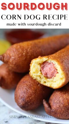 sausage corn dog recipe made with sourdough biscuits on a white plate