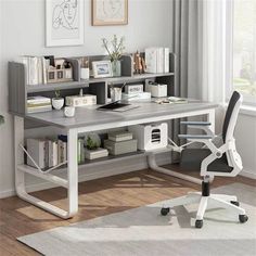 an office with a desk, chair and bookshelf in the middle of it