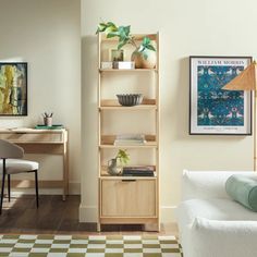 a living room filled with furniture and a white chair next to a desk on top of a checkered rug