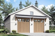 a two car garage with three windows on the front and one door open to let in light