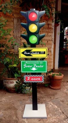 a traffic light sitting on the side of a road