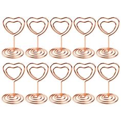 twelve heart shaped cupcake toppers in various sizes