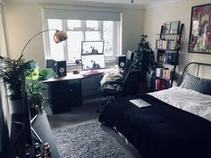 the bedroom is clean and ready to be used as a home office or work space