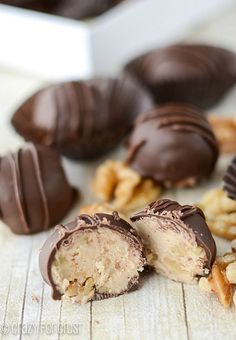 several chocolates and nuts on a table