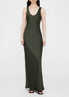 Designed by Anine Bing. A lustrous maxi-length silhouette crafted from 25 mm double-faced silk charmeuse with a semi-shiny finish in dark olive. Cut on the bias with a bustier lining, the Camille Dress features a figure-flattering shape. Fit: The Camille Dress is cut for a slim fit with a maxi-length hemline. Take your true size. Model is wearing a size S. Model Measurements: Height: 5'10", Bust: 30", Waist: 23", Hips: 34" Product Measurements (Size S): Length: 56”, Bust: 33" Materials + Care: 100% Silk. Dry clean. Return Policy Camille Dress, Summer Shoe, Vintage Indigo, Capri Blue, Sport Dress, Silhouette Crafts, Anine Bing, Silk Charmeuse, Wardrobe Basics