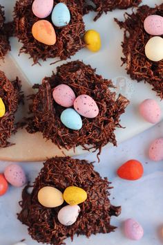 chocolate nests with candy eggs on a plate