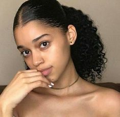 Low curly ponytail with middle part Low Back Ponytail Natural Hair, Slicked Back Middle Part Ponytail, Low Curly Ponytail Natural Hair, Slik Ponytail Styles Curly Hair, Middle Part Curly Ponytail, Low Middle Part Ponytail, Black Women Curly Ponytail, Ponytail With Middle Part, Curly Hair Low Ponytail