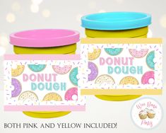 two pink and yellow cups with donuts on them