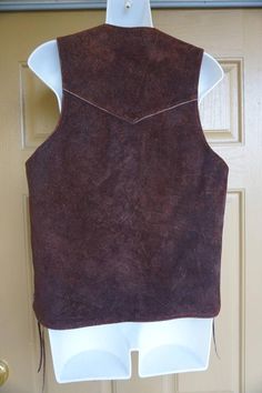 Vintage 1970s suede leather vest. Fully lined. Tag Size: None- Estimated size small or maybe medium -please see measurementsMeasurements:Armpit to armpit:  19Length:  22"Condition: -see photosDescription: Men's vintage 1970's  suede leather vest Brown Rugged Vest For Winter, Brown Rugged Winter Vest, Rugged Brown Winter Vest, 1970s Men, Sparkly Party, Tent Dress, Burberry Brit, Mens Vests, Burberry Jacket