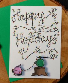 a happy birthday card with an image of a turtle holding a tree stump and the words happy holidays written on it