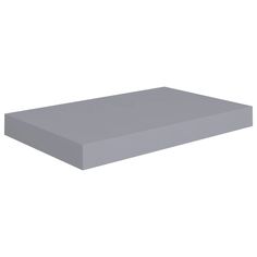 a large gray box sitting on top of a white surface with no one around it