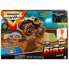 the monster jam build it to jump it kit includes an all terrain vehicle and sand pit