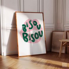 a poster with the words bisou bisou on it next to a chair