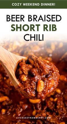 a wooden spoon filled with beef and beans next to the words beer braised short rib chili