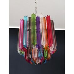 a multicolored chandelier hanging from a ceiling