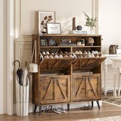 a wooden cabinet with shoes on it in front of a dining room table and chairs