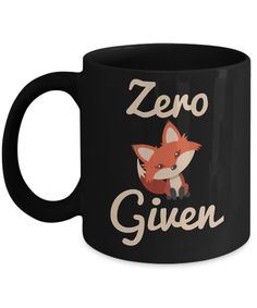 a black coffee mug with an image of a fox on it that says zero given