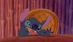 an animated image of a ratty mouse with its mouth open and tongue out, sitting at a table