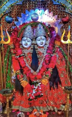 an idol is shown with candles and decorations