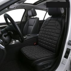 the interior of a white car with black leather seats