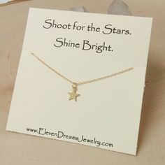 Wear jewelry with a personal meaning .. Or gift something special to someone.  This dainty gold star Charm Necklace reminds the wearer to "Shoot for the Stars" And "Shine Bright".  Reminders we all can use sometimes :) 14k gold filled chain Spring clasp closure 14k goldfill star Charm Adjustable length at 16" and 18" **Arrives carded and sealed in a clear plastic poly bag ready for gift giving. It is then wrapped in tissue paper and tied with yarn. Not in a box, to be environmentally friendly, u Minimalist Star Charm Necklaces For Gift, Minimalist Star Charm Necklace Gift, Tiny Star-shaped Jewelry Gift, Tiny Star Shaped Jewelry Gift, Star-shaped Jewelry With Star Charm For Gift, Star Shaped Jewelry With Star Charm For Gift, Star Charm Necklace For Gift, Star Charm Jewelry As Gift, Star Charm Necklace As Gift