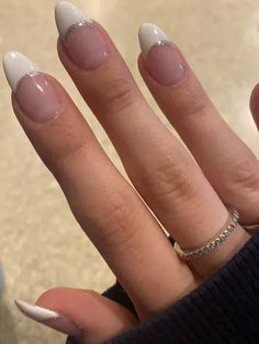 White And Sparkly French Tip Nails, French Tip Acrylic Nails With Line Under, Nails To Wear With White Dress, White Tip With Silver Line Nails, French Tip Nails White With Glitter, French Tip W Silver Line, Hoco Nails Oval, White And Silver Tip Nails, French Tip Nails Silver Line