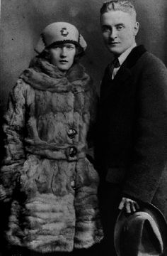 an old photo of two people dressed in furs and hats with the caption zelda f scott fitzgerald