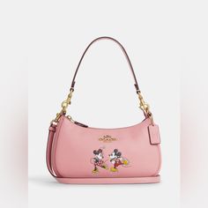 Product Details Refined Pebble Leather Two Credit Card Slots Inside Multifunction Pocket Zip-Top Closure, Fabric Lining Detachable Handle With 8 1/4" Drop Detachable Strap With 22 3/4" Drop For Shoulder Or Crossbody Wear 9 1/2" (L) X 6" (H) X 3" (W) Disney X Coach Disney Style No. Cm858 Crossbody Shoulder Bag For Disney Trips, Coach Teri Shoulder Bag, Coach Disney, Coach Leather Bag, Studded Handbag, Blue Tote Bag, Glam Bag, Ice Skate, Black Leather Satchel