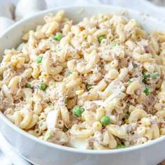 a white bowl filled with macaroni and cheese