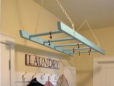 an old ladder for the laundry room - perfect for hanging things to dry