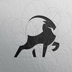 an animal logo is shown on the side of a piece of paper with circles around it