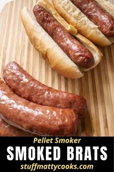 three sausages on a cutting board with the words pellet smoker smoked brats