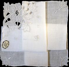 New old stock, vintage hanky embellished with white embroidery and cutwork in one corner. This is a fine accessory, even for a bride to carry on her wedding day. Made of an off white linen, and measuring 11 inches, with hand rolled edges. Original tag in tact. Hand made in Madeira, Portugal. Vintage Floral Embroidery Wedding Handkerchiefs, Vintage Embroidered Handkerchiefs For Wedding, Vintage Embroidered Wedding Handkerchiefs, Vintage White Handkerchiefs With Lace Work, Vintage Lace Trim Handkerchiefs For Wedding, Vintage White Lace Handkerchiefs, Elegant White Floral Embroidered Handkerchiefs, Elegant White Handkerchiefs With Floral Embroidery, Vintage Wedding Handkerchiefs With Lace Trim